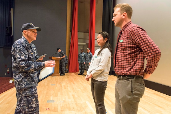 October 20, 2017) YOKOSUKA, Japan. Vice Adm. Phil Sawyer, commander, U.S. 7th Fleet, awards two Flag Letter of Commendation to the two ombudsmen of the Arleigh Burke-class guided-missile destroyer USS Fitzgerald (DDG 62) for their support to families after a collision with the merchant vessel on June 17.