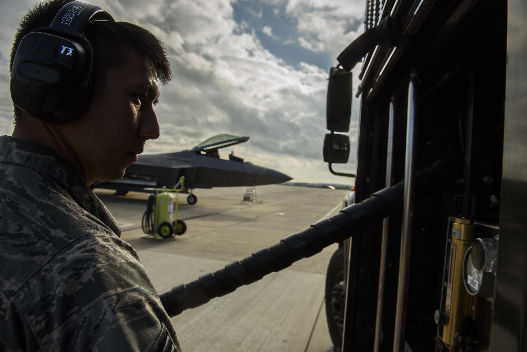 Senior Airman Josh Kampa, 52nd Logistic Readiness Squadron fuels distribution operator, refuels an F-22 Raptor assigned to the 1st Fighter Wing, Joint Base Langley-Eustis, Va., at Spangdahlem Air Base, Germany, Oct. 13, 2017.