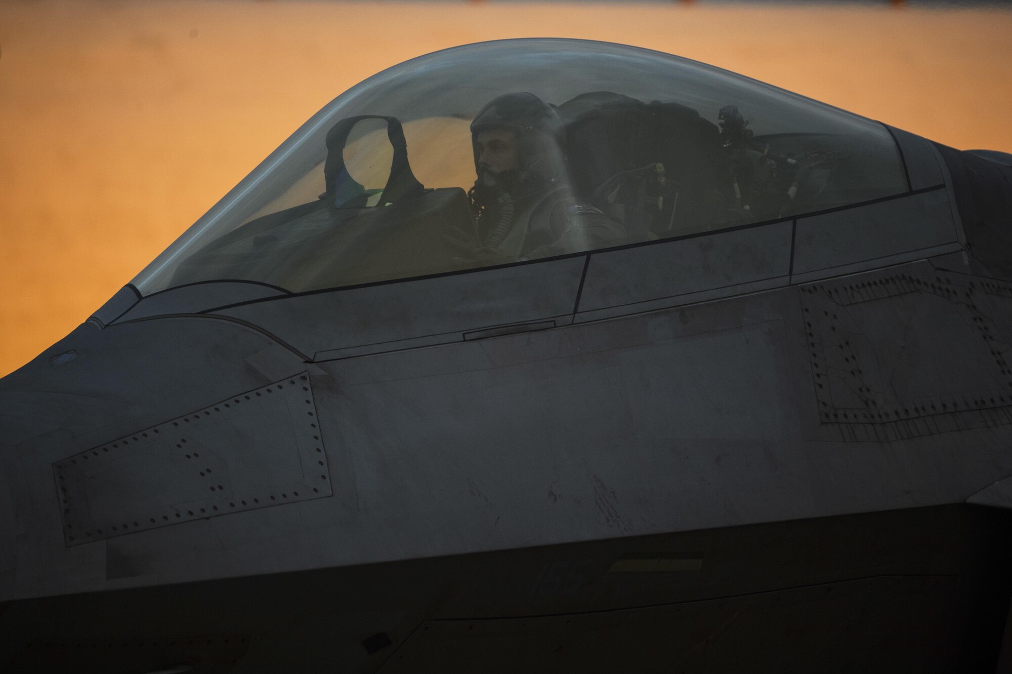 An F-22 Raptor pilot assigned to the 1st Fighter Wing, Joint Base Langley-Eustis, Va., conducts a preflight check at Spangdahlem Air Base, Germany, Oct. 13, 2017.