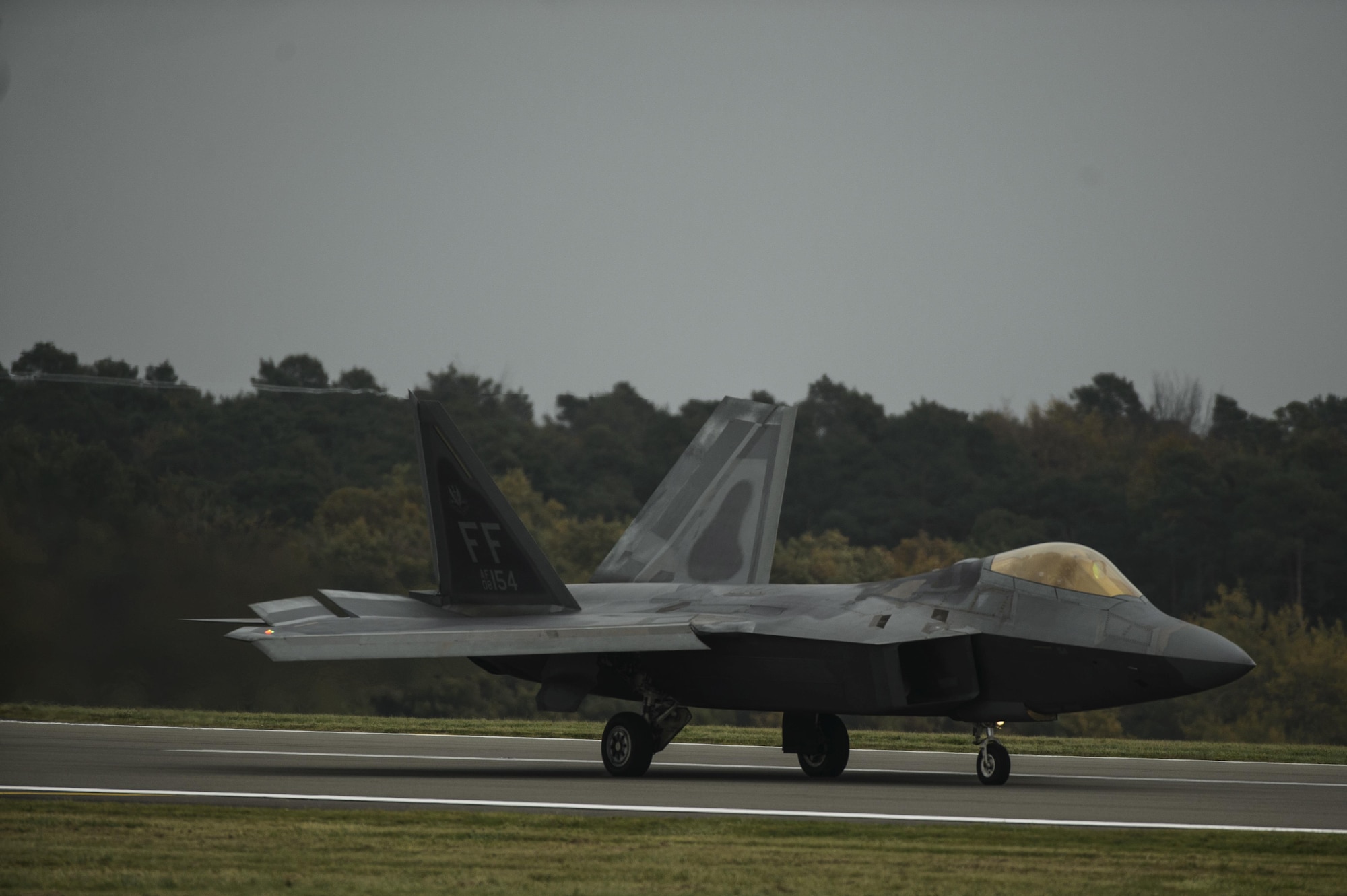 An F-22 Raptor assigned to the 1st Fighter Wing, Joint Base Langley-Eustis, Va., lands at Spangdahlem Air Base, Germany, Oct. 13, 2017.