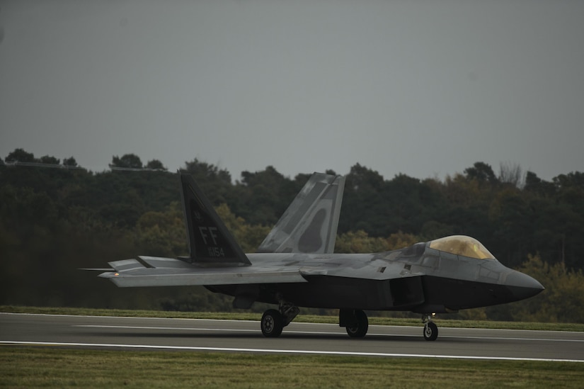 An F-22 Raptor assigned to the 1st Fighter Wing, Joint Base Langley-Eustis, Va., lands at Spangdahlem Air Base, Germany, Oct. 13, 2017.