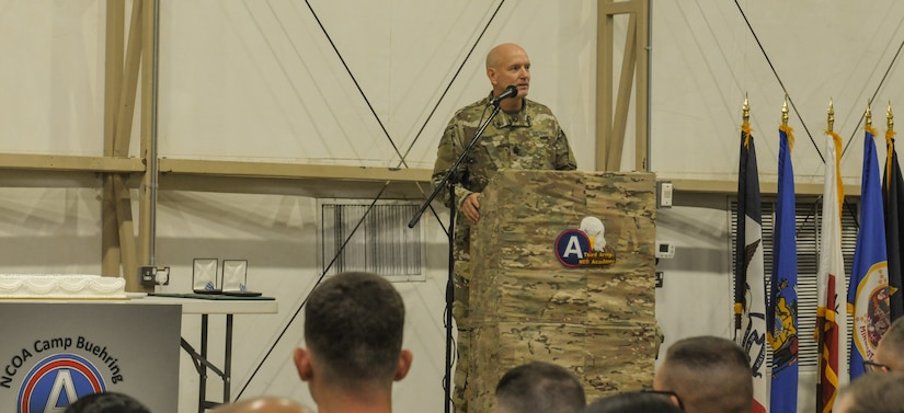 Soldier at a podium giving a speech.