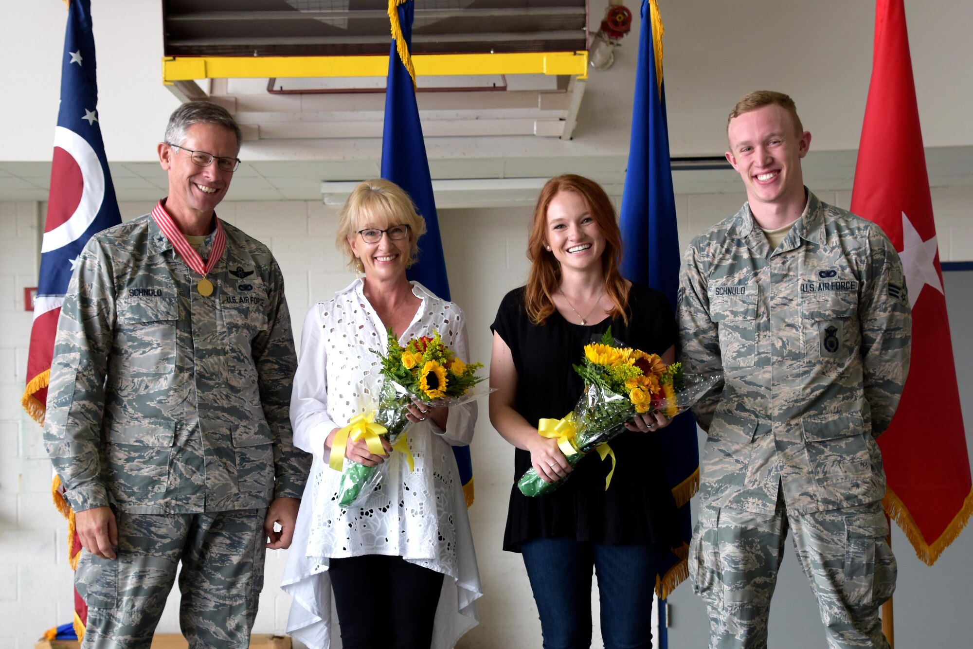 Brig. Gen. Gregory N. Schnulo, the assistant adjutant general for the Ohio Air National Guard, celebrates his retirement with his family at Springfield Air National Guard Base in Ohio, Oct. 15, 2017. Schnulo served for 37 years in the United States Air Force. His dedication to Airmen allowed him to rise through the ranks and serve in many leadership positions throughout his military career. (Ohio Air National Guard photo by Airman Amber Mullen)