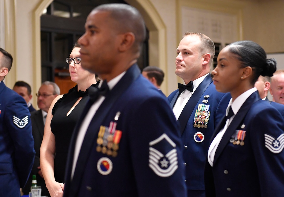 Air Force Master Sgt. Darryl Lane, center, 628th Medical Group training manager, stands with the Airman Leadership School’s commandant and other instructors during a graduation ceremony at Joint Base Charleston, S.C., Aug. 31, 2017. Lane filled an instructor shortage at the school by volunteering to teach until a new instructor arrives. Air Force photo by Staff Sgt. Andrea Salazar