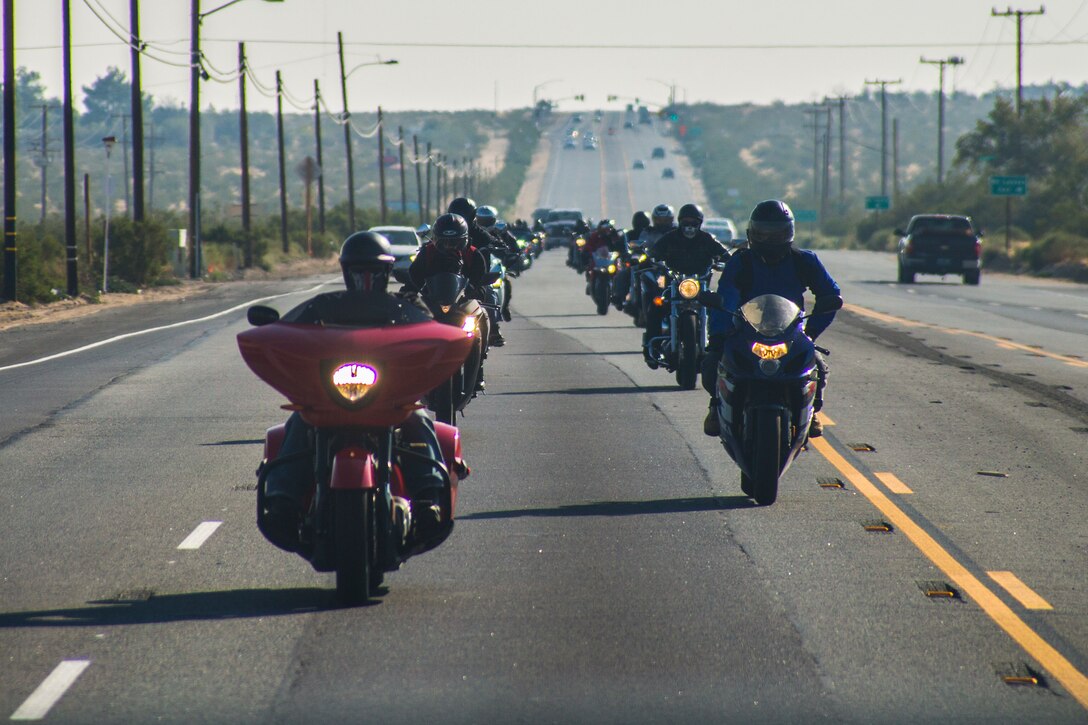 Motorcyclists ride down Highway 62 during the 4th Annual Roar Against Domestic Violence Motorcycle Ride, Oct. 13, 2017. The ride was hosted to raise awareness for domestic violence amongst Combat Center patrons as well as provide them with resources in the event that they suspect an incident of domestic violence has occurred. (U.S. Marine Corps photo by Cpl. Medina Ayala-Lo)