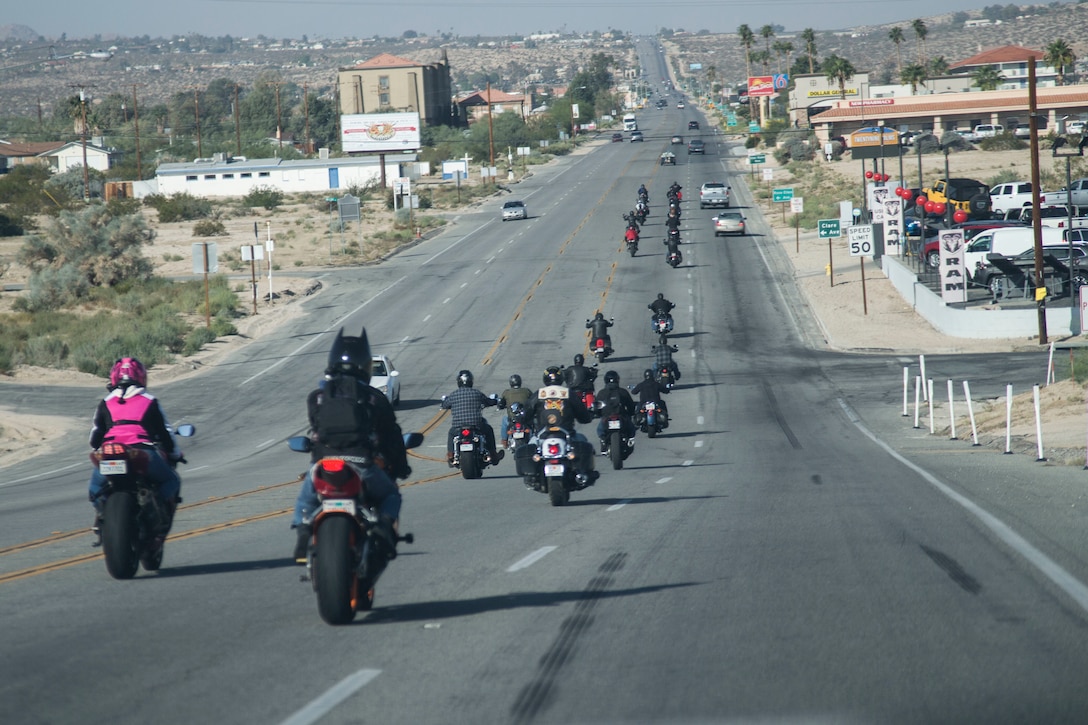 Motorcyclists ride down Highway 62 during the 4th Annual Roar Against Domestic Violence Motorcycle Ride, Oct. 13, 2017. The ride was hosted to raise awareness for domestic violence amongst Combat Center patrons as well as provide them with resources in the event that they suspect an incident of domestic violence has occurred. (U.S. Marine Corps photo by Cpl. Medina Ayala-Lo)