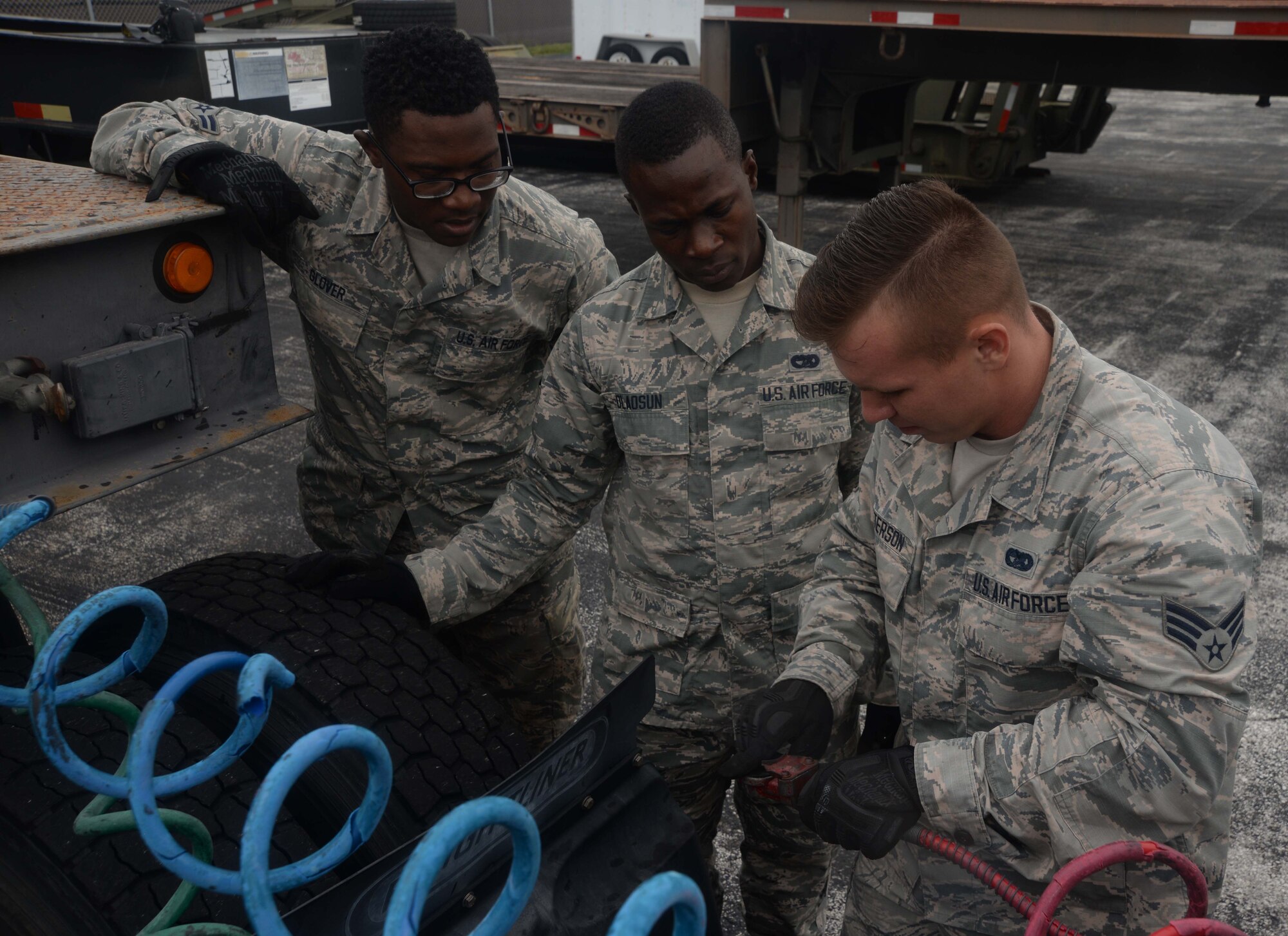 U.S Air Force vehicle operators assigned to the 6th Logistics Readiness Squadron train on how to properly attach a trailer to a tractor on MacDill Air Force Base, Fla. Oct. 17, 2017.