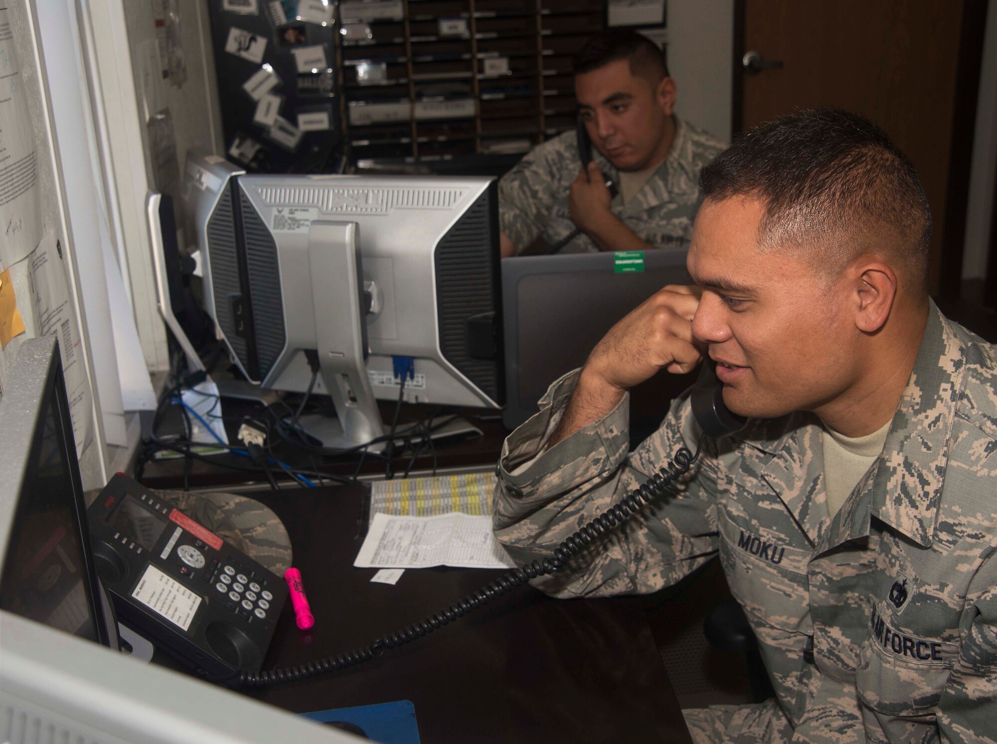 U.S Air Force Staff Sgt. Dayton Moku, the NCO in charge of Documented Cargo assigned to the 6th Logistics Readiness Squadron, receives a transport request on MacDill Air Force Base, Fla. Oct. 19, 2017.