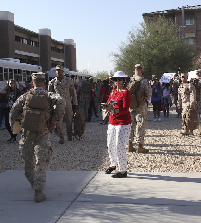 Families and Marines search for each other during the 1st Battalion, 7th Marine Regiment homecoming at barracks 1403 and 1404 aboard the Marine Corps Air Ground Combat Center, Twentynine Palms, Calif., Oct. 13, 2017. The Marines had not seen their families for more than six months since being deployed and for some Marines this was the first time they held their children.