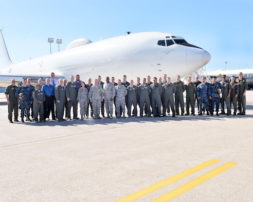 Chief of Staff of the Air Force Gen. David L. Goldfein, sixth from the left in the front row, and Chief Master Sgt. of the Air Force Kaleth O. Wright, fifth from the right in the front row, pose for a photo in front of a Boeing E-6B Mercury Navy aircraft with the 625th Strategic Operations Squadron at Offutt Air Force Base, Nebraska, Oct. 18, 2017. Goldfein and Wright spent much of the day touring the facilities and gaining insight into the base's 
current mission sets.