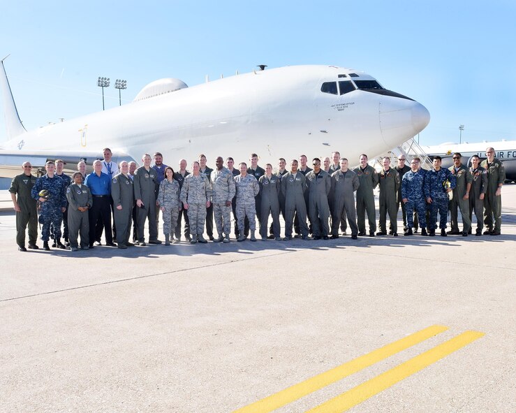 Chief of Staff of the Air Force Gen. David L. Goldfein, sixth from the left in the front row, and Chief Master Sgt. of the Air Force Kaleth O. Wright, fifth from the right in the front row, pose for a photo in front of a Boeing E-6B Mercury Navy aircraft with the 625th Strategic Operations Squadron at Offutt Air Force Base, Nebraska, Oct. 18, 2017. Goldfein and Wright spent much of the day touring the facilities and gaining insight into the base's 
current mission sets.