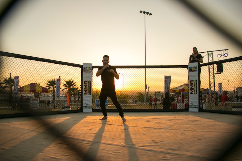 A Fight Night competitor prepares for his fight in the octagon at Victory Field, aboard the Marine Corps Air Ground Combat Center, Twentynine Palms, Calif., Oct. 13, 2017. Fight Night is an annual event hosted by Marine Corps Community Services to boost the morale of service members aboard the Combat Center. (U.S. Marine Corps photo by Cpl. Dave Flores)