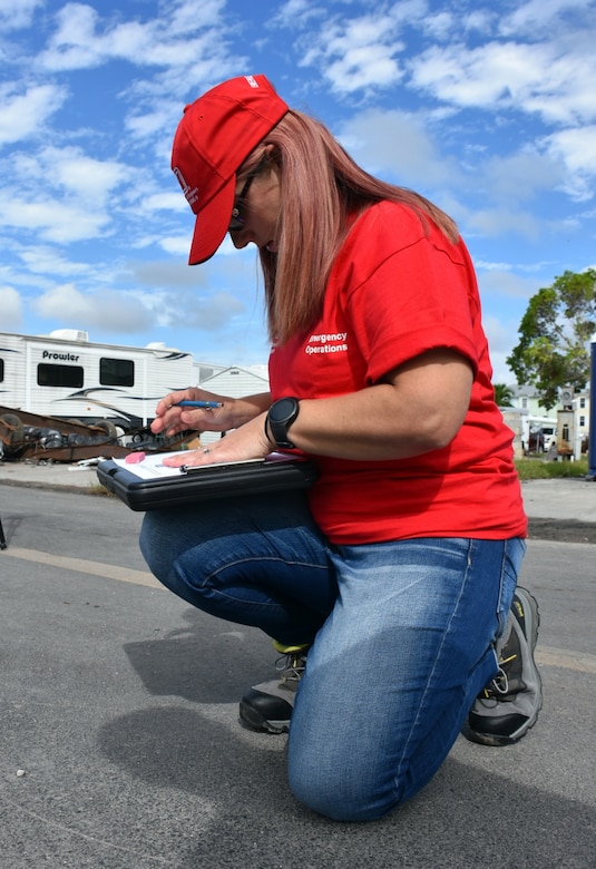 Anita Bradburn, a quality assurance inspector with the U.S. Army Corps of Engineers, Huntington District, draws a sketch during a temporary housing site inspection in Everglades City, Fla.