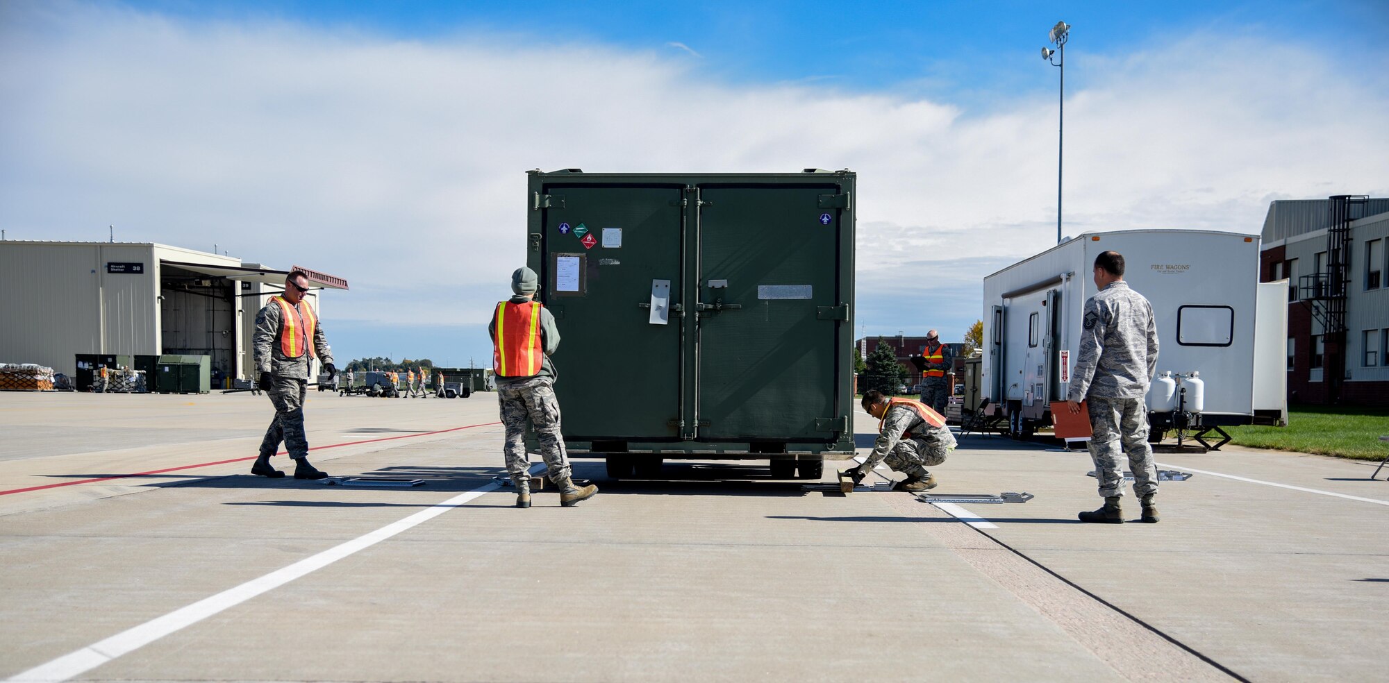 114th Logistics Readiness Squadron Airmen weigh equipment needed for the deployment during the Phase 1 of the Attack Response Exercise (ARE) from Oct. 10, 2017, at Joe Foss Field, S.D.