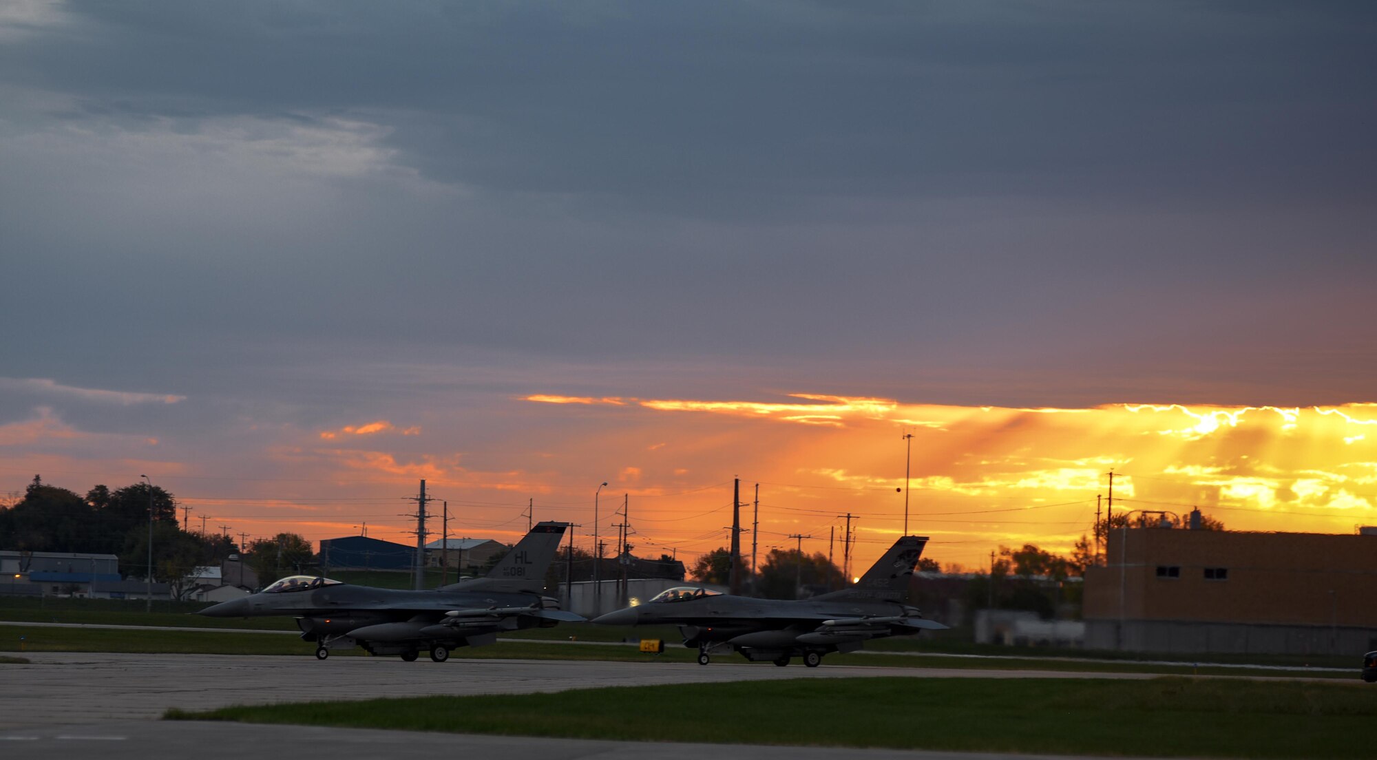 175th Fighter Squadron F-16s sat on the runway before takeoff during the Phase 1 of the Attack Response Exercise (ARE) Oct. 13, 2017, Joe Foss Field, S.D.