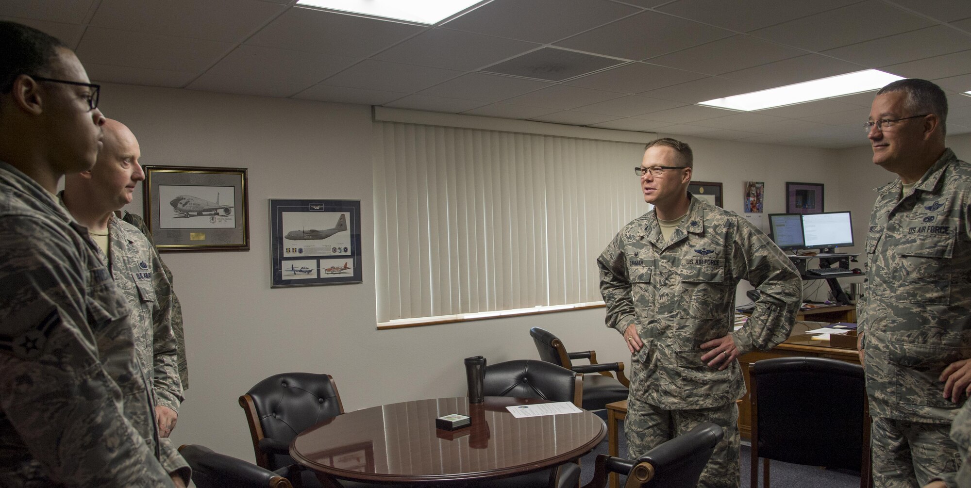 6th Communications Squadron Airmen speak to 6th Operations Support Squadron Airmen during a Shadow Program at MacDill Air Force Base, Fla. Oct. 18, 2017. In the program, Airmen spend a few hours with another squadron observing what their Airmen do.  (U.S. Air Force photo by Senior Airman Mariette Adams)