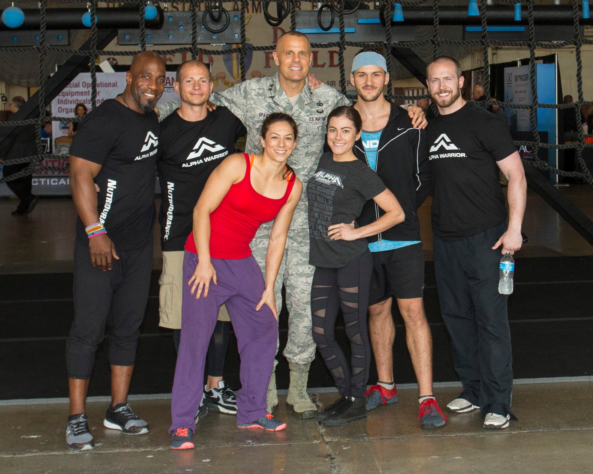 Maj. Gen. Brad Spacy (middle), AFIMSC commander, is pictured with the Alpha Warrior team, he will be on hand for the Air Force Alpha Warrior Final Battle Nov. 11 and commemorating Veterans Day with opening remarks.
