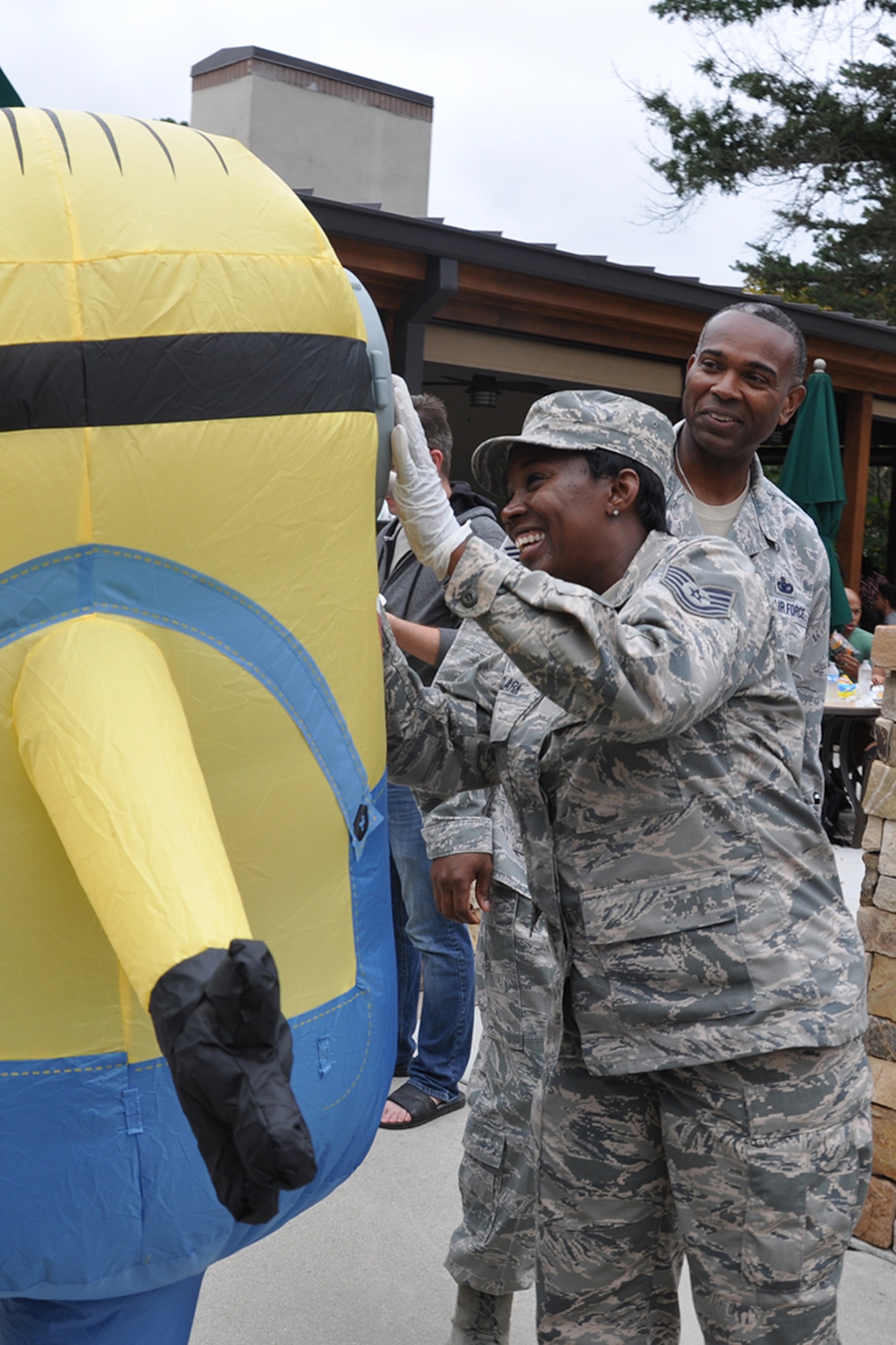 A Reserve Citizen Airman interacts with a mascot at this year's Family Day Oct. 14, 2017 at Dobbins Air Reserve Base, Ga. Family Day is held here annually as a way of bringing families on base to see what their Reserve Citizen Airmen do on drill weekends. (U.S. Air Force photo/Master Sgt. James Branch)