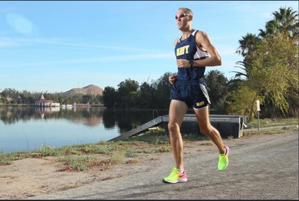 Lt. Patrick Hearn, assigned to Naval Surface Warfare Center (NSWC), Corona Division, runs around Lake Norconian.