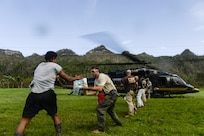 The U.S. Department of Homeland Security delivers food and water to isolated Puerto Rico residents after their bridge was destroyed by Hurricane Maria in the mountains around Utuado, Puerto Rico, Oct. 12, 2017. The Federal Emergency Management Agency and its federal partners continue 24-hour operations to conduct missions in support of those affected by Hurricane Maria.