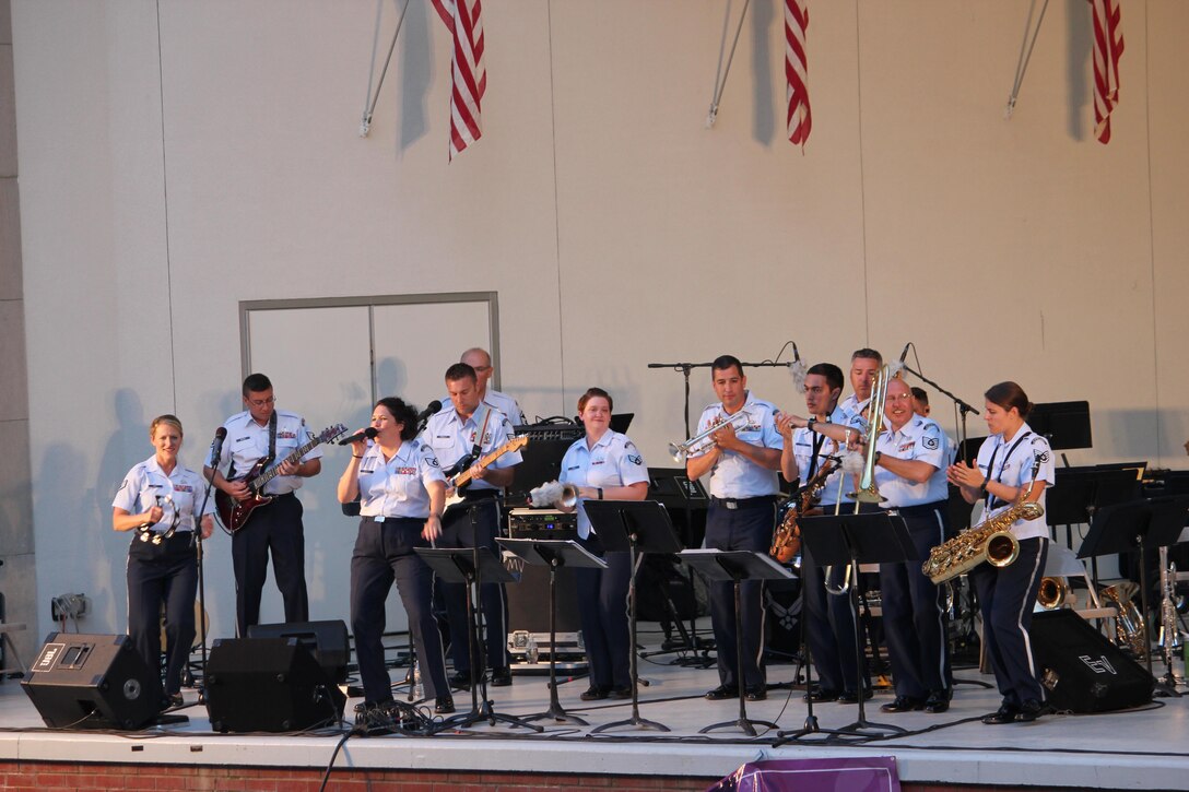 Members of the Air National Guard Band of the Northeast performed a concert at Guy C. Myers Band Shell in Ashland Ohio on 28 June 2017. This was one of the band's concerts on our 2017 Summer Music Concert Series titled "Celebrating Great American Cities". Pictured are members of High Altitude. (U.S. Air Force Photo/Technical Sgt. Dawn Hoffman)