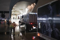 Airmen from the 123rd Airlift Wing load a Disaster Relief Mobile Kitchen Trailer onto a C-17 Globemaster III aircraft at the Kentucky Air National Guard Base in Louisville, Ky., Oct. 11, 2017, to be transported to San Juan, Puerto Rico. Seven Airmen from the wing’s 123rd Services Flight will employ the trailer to serve up to 4,000 hot meals per day to hurricane relief forces. (U.S. Air National Guard photo by Lt. Col. Katrina Bramlett)