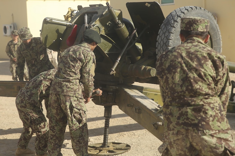 Afghan National Army soldiers with Artillery Brigade, 215th Corps execute a gun drill on a 122mm howitzer D-30 during an artillery course at Camp Shorabak, Afghanistan, Oct. 21, 2017. More than 20 soldiers with the unit are conducting the eight-week course, which is designed to enhance the soldiers’ employment of artillery on the battlefield and build their hands-on skills with the D-30 weapon system. (U.S. Marine Corps photo by Sgt. Lucas Hopkins)