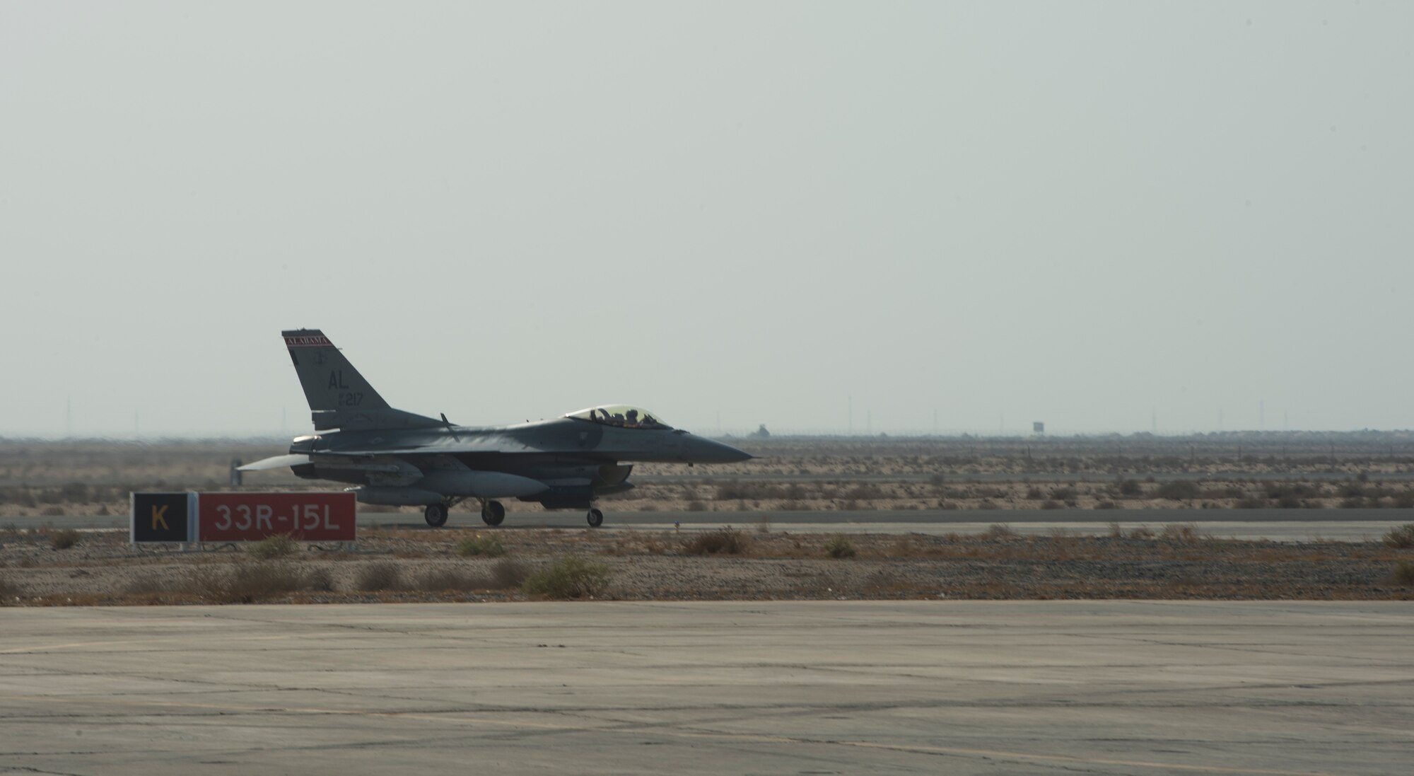 An F-16 Fighting Falcon from the 100th Fighter Squadron arrives at the 407th Air Expeditionary Group in Southwest Asia, Oct. 16, 2017. In an air combat role, the F-16's maneuverability and combat radius exceed that of all potential threat fighter aircraft. It can locate targets in all weather conditions and detect low flying aircraft in radar ground clutter. (U.S. Air Force photo by Staff Sgt. Sean Martin/Released)