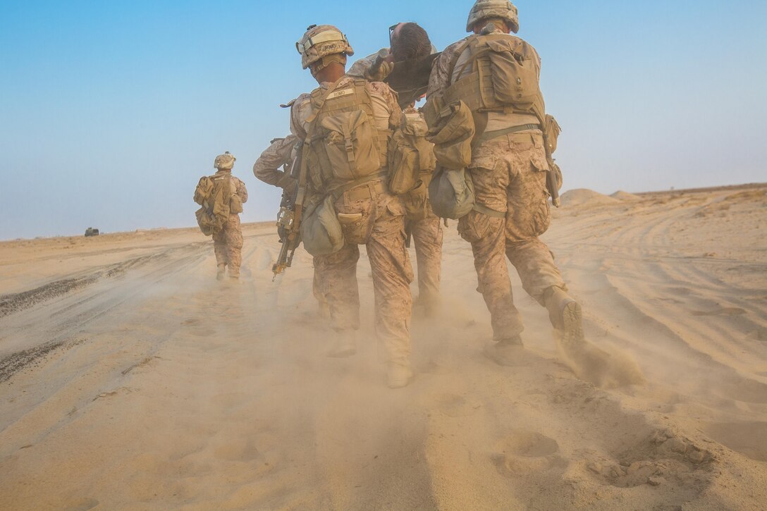U.S Marines with 2nd Battalion, 7th Marine Regiment evacuate a casualty during a quick reaction force exercise in the Middle East Oct. 10, 2017. They are part of a QRF that is capable of responding to developing situations on short notice. Marines with 2/7 were tasked to conduct a QRF to quickly recover simulated casualties and take them back to safety. This was the first exercise 2/7 has conducted after replacing 1st Battalion, 7th Marine Regiment in the U.S. Central Command area of operations.
