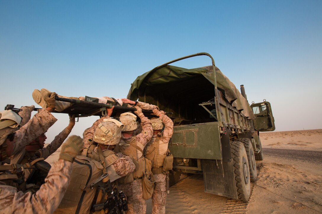 U.S Marines with 2nd Battalion, 7th Marine Regiment evacuate a casualty during a quick reaction force exercise in in the Middle East Oct. 10, 2017. They are part of a quick reaction force that is capable of responding to developing situations on short notice. Marines with 2/7 were tasked to conduct a QRF to quickly recover simulated casualties and take them back to safety. This was the first exercise 2/7 has conducted after replacing 1st Battalion, 7th Marine Regiment in the U.S. Central Command area of operations.
