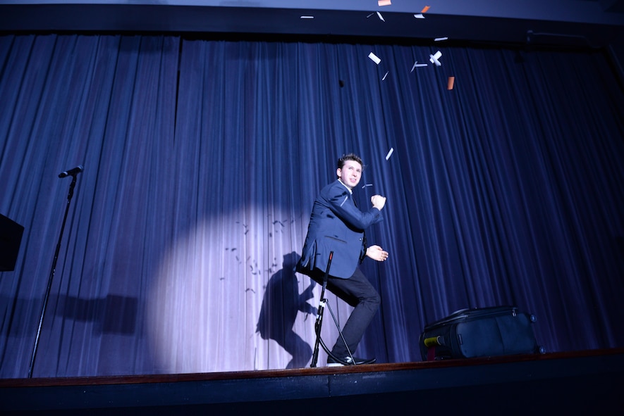 Benjamin Young, magician, performs during a show Oct. 13, 2017, on Columbus Air Force Base, Mississippi. Young is an opening magician and assistant for Jason Michaels, illusionist and magician, and they’ve been performing on military bases around the world. (U.S. Air Force photo by Airman 1st Class Keith Holcomb)