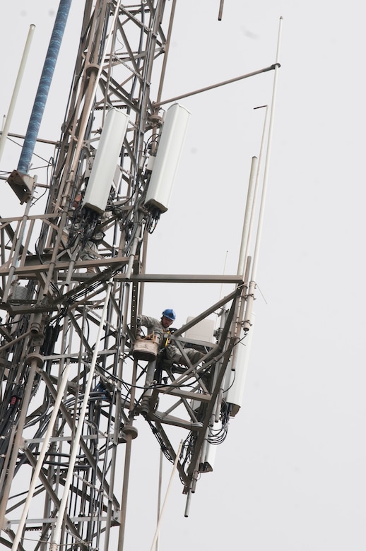 An airman with the 85th Engineering and Installation Squadron from Keesler Air Force Base, Miss., works atop a radio tower at Cerra de Punta Mountain near Ponce, Puerto Rico, Oct. 20, 2017. The 85th EIS are working to reestablish and improve radio communications for local emergency personnel and first responders across the island. Army photo by Sgt. Thomas Calvert