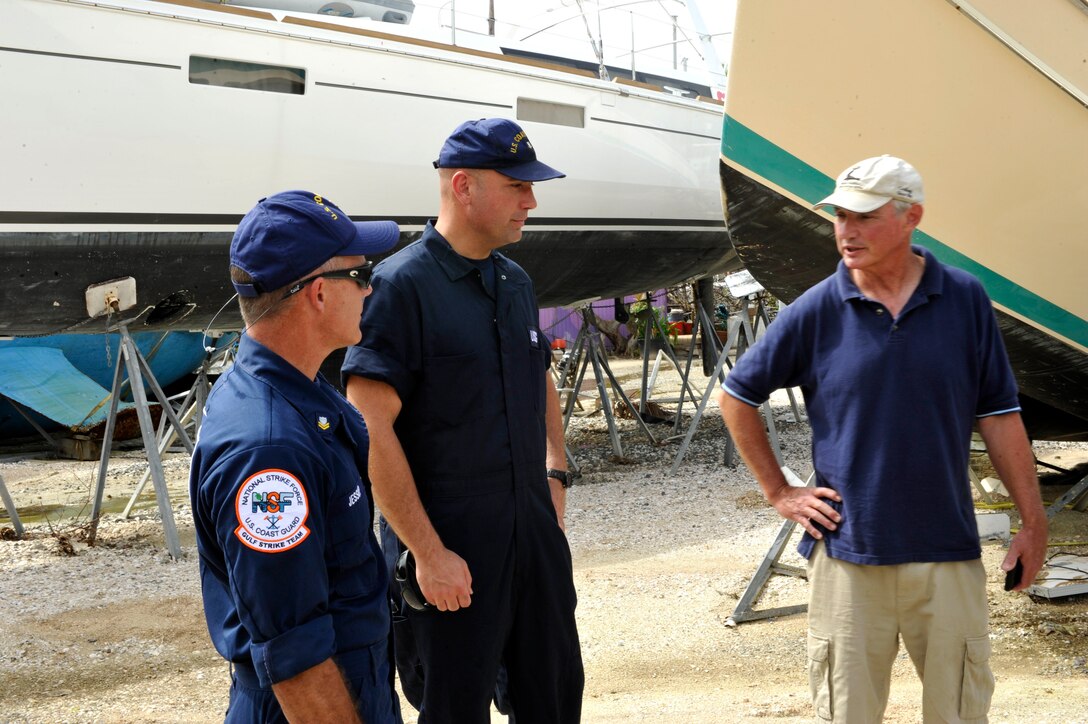 Responders discuss damage to vessels after Hurricane Maria.