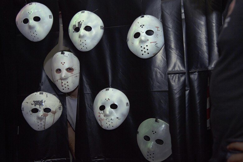 A volunteer for the MacThrillville haunted house demonstrates his character’s role at MacDill Air Force Base, Fla., Oct. 20, 2017.