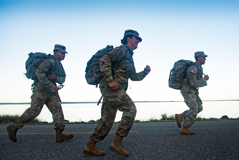 U.S. Army Soldiers ruck march during the German Armed Forces Proficiency Badge evaluation at Joint Base Langley-Eustis, Va., Oct. 19, 2017.