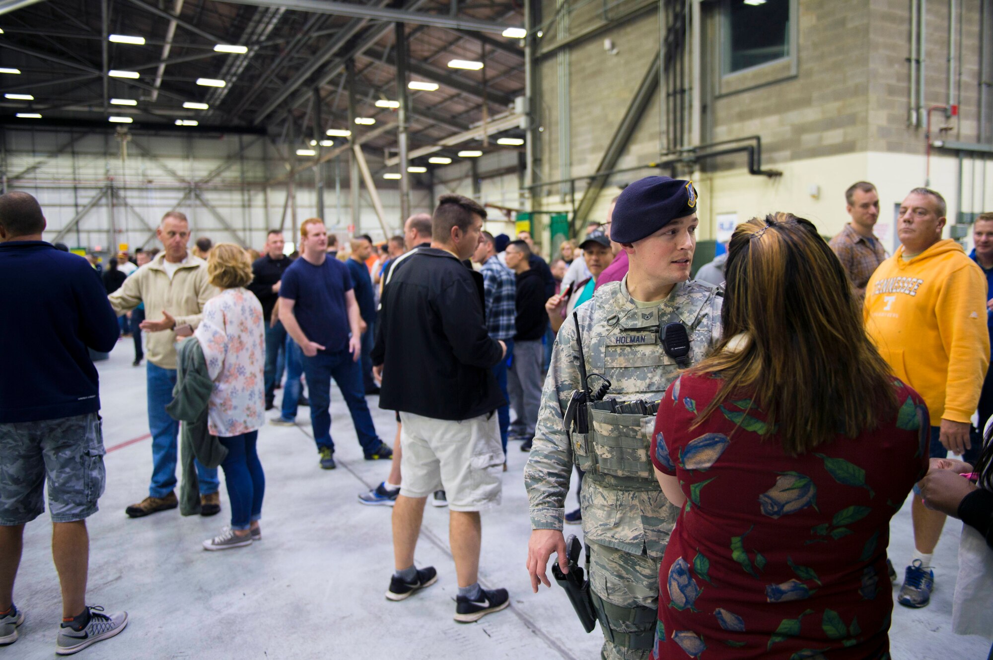 Staff Sgt. Caleb Holman, 434 Security Forces Squadron fire team member, talks with attendees while providing security for Wingman Day at Grissom Air Reserve Base, Ind., October 15, 2017. Wingman Day is a Reserve-wide event held each year to bring Airmen together in a relaxed environment and encourage them to become better wingmen. (U.S. Air Force photo/ Senior Airman Harrison Withrow)