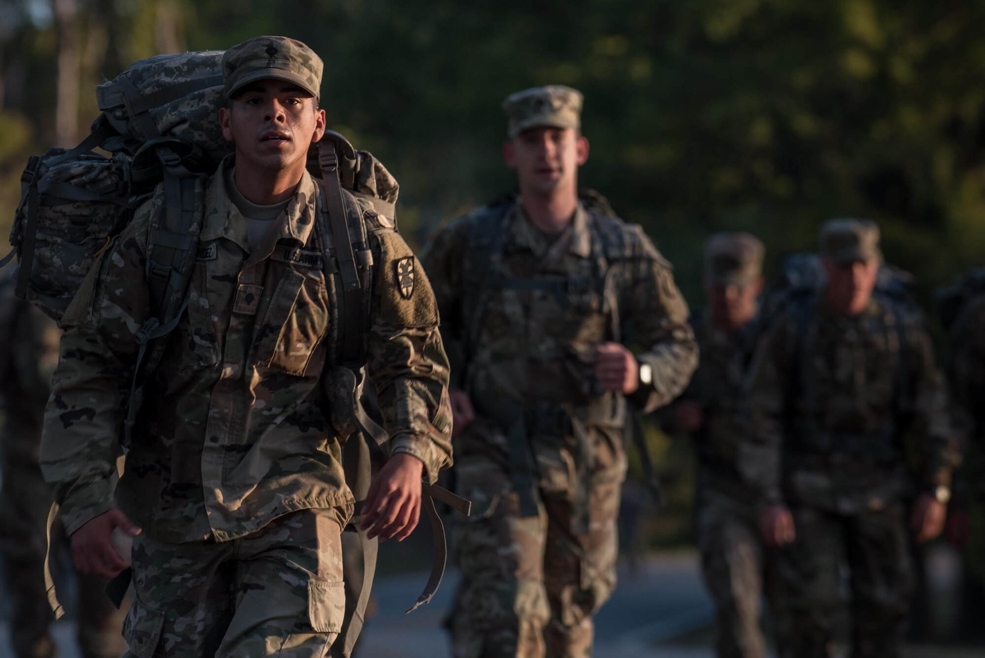 U.S. Army Sgt. Raquel Nunez-Hedrick, German Armed Forces Proficiency Badge competitor, dons her helmet before entering the shooting range at Joint Base Langley-Eustis, Va., Oct. 20, 2017.