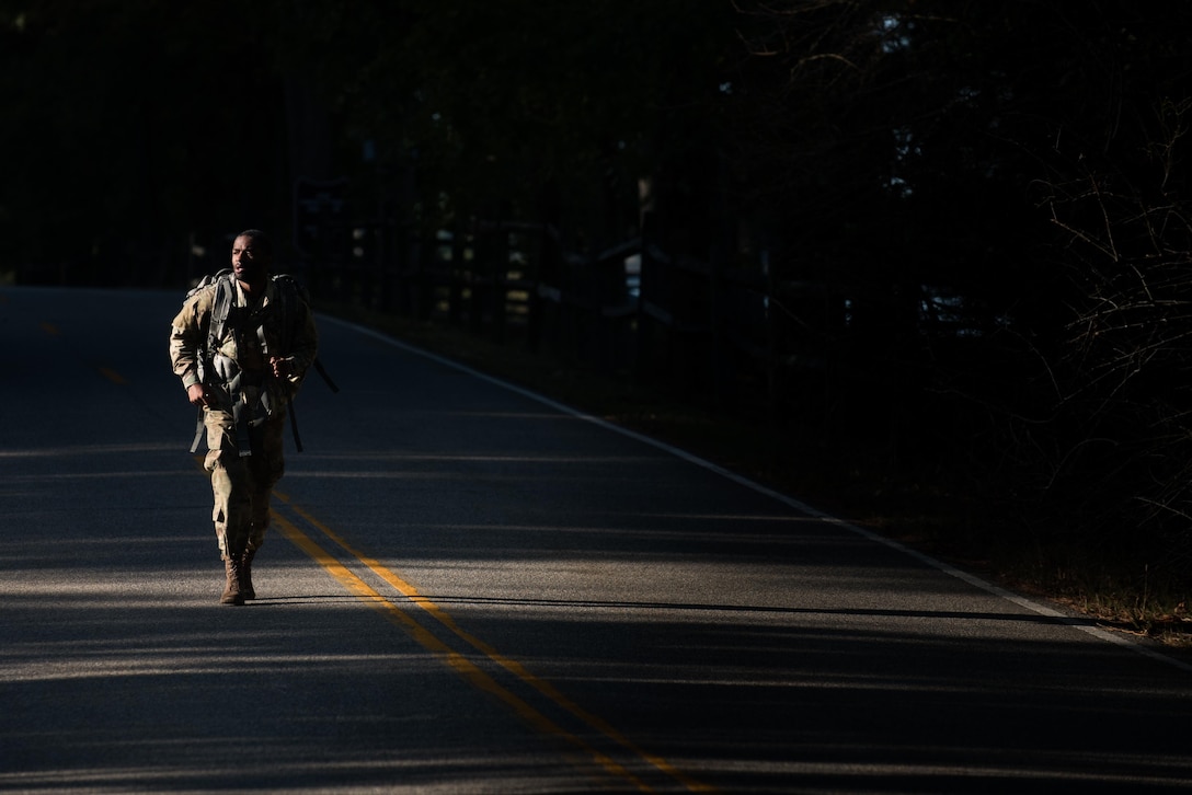 U.S. Army Private 1st Class Mynez Nicholson, German Armed Forces Proficiency Badge competitor, ruck marches for gold during the German Armed Forces Proficiency Badge evaluation at Joint Base Langley-Eustis, Va., Oct. 19, 2017.