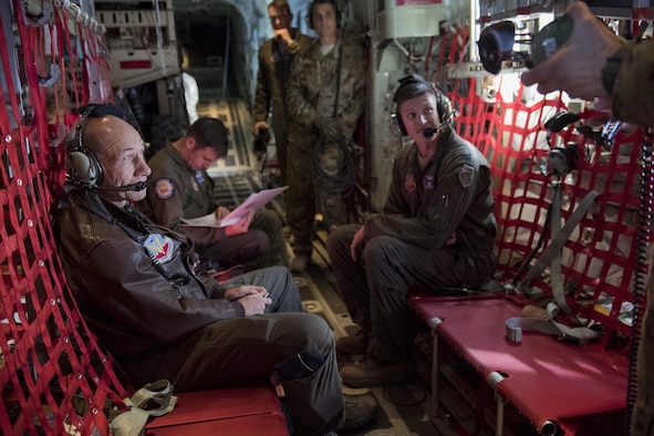 Gen. Mike Holmes, commander of Air Combat Command, talks to Airmen over the communications system, Oct. 17, 2017, onboard an HC-130J Combat King II headed to Moody Air Force Base, Ga.