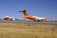 Taxied at former McClellan Air Force Base, the red-and-white 747 known as the "Spirit of John Muir" (left), and air tankers (right) work all day releasing cargo and fire retardant in support of the wildfires in Northern California.