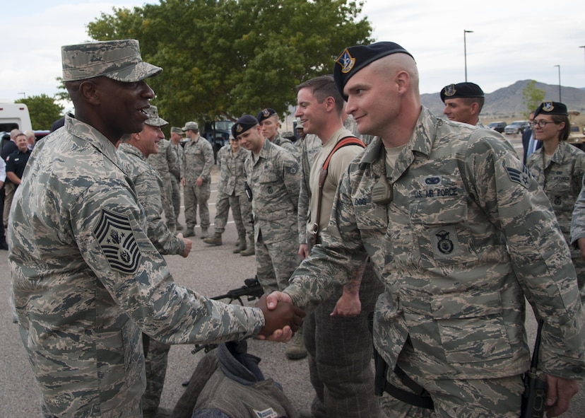 U.S. Air Force Chief Master Sergeant of the Air Force Kaleth O. Wright greets members of the 377th Security Forces Group at Kirtland Air Force Base, N.M., Oct. 20.