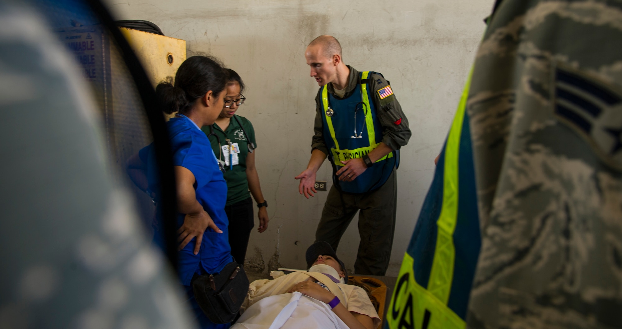 Capt. Adam Altman, 15th Aerospace Medical Squadron flight surgeon, instructs nursing students on triage procedures during the 2017 Triennial Emergency Response Exercise at the Daniel K. Inouye International Airport, Honolulu, Hawaii, Oct. 20, 2017.