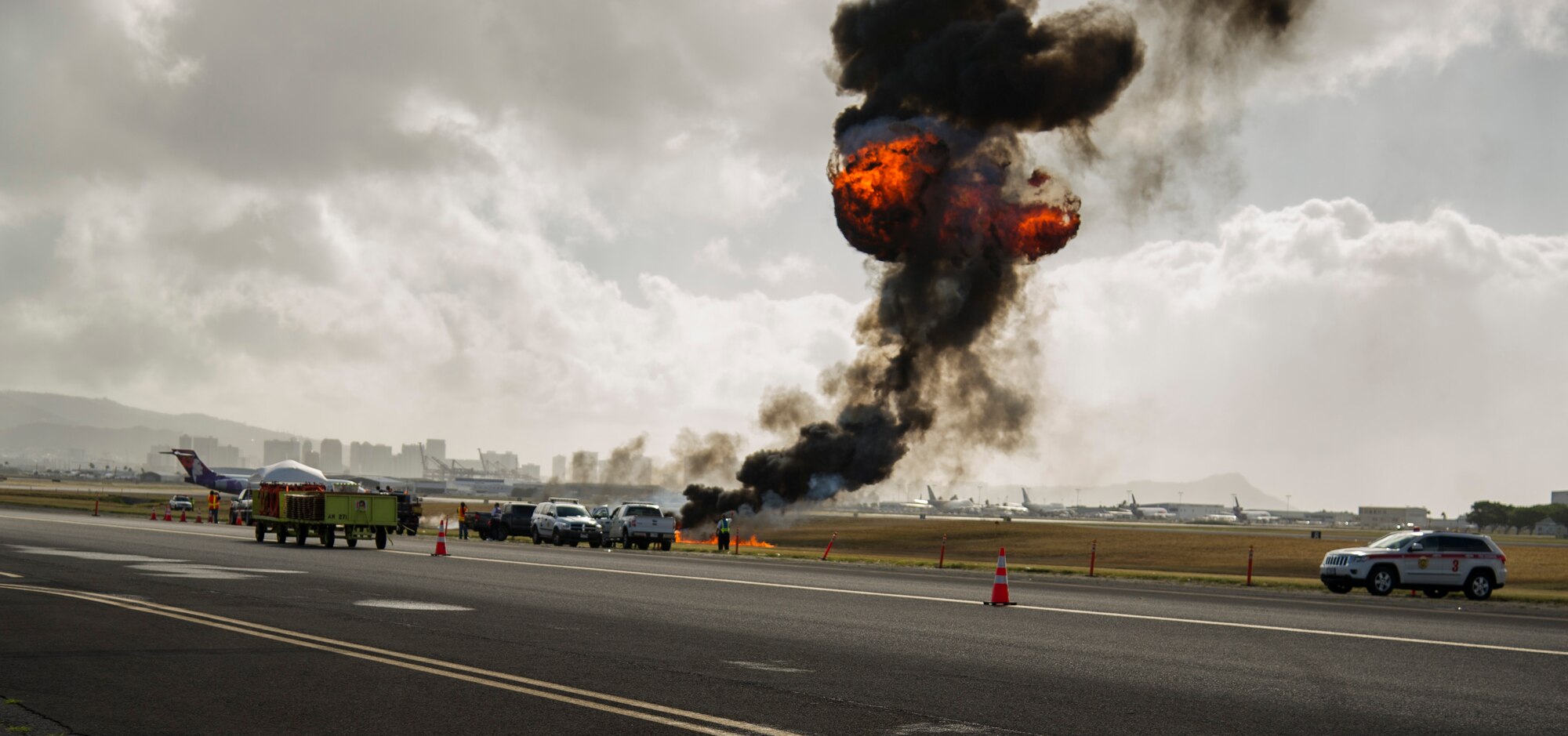 A controlled detonation signals the start of the 2017 Triennial Emergency Response Exercise at the Daniel K. Inouye International Airport, Honolulu, Hawaii, Oct. 20, 2017.