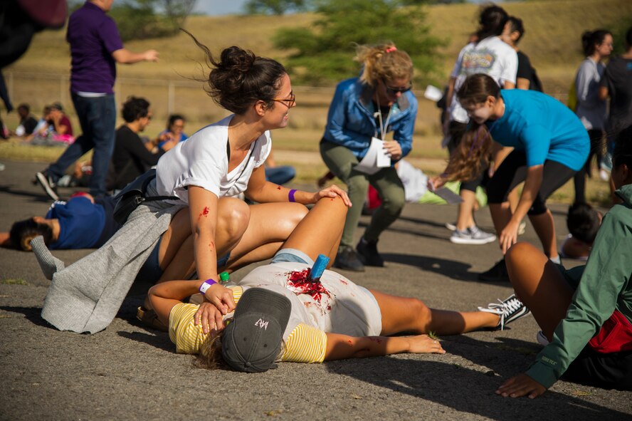 Volunteers wear make-up and prosthetics to simulate injuries during the 2017 Triennial Emergency Response Exercise at the Daniel K. Inouye International Airport, Honolulu, Hawaii, Oct. 20, 2017.