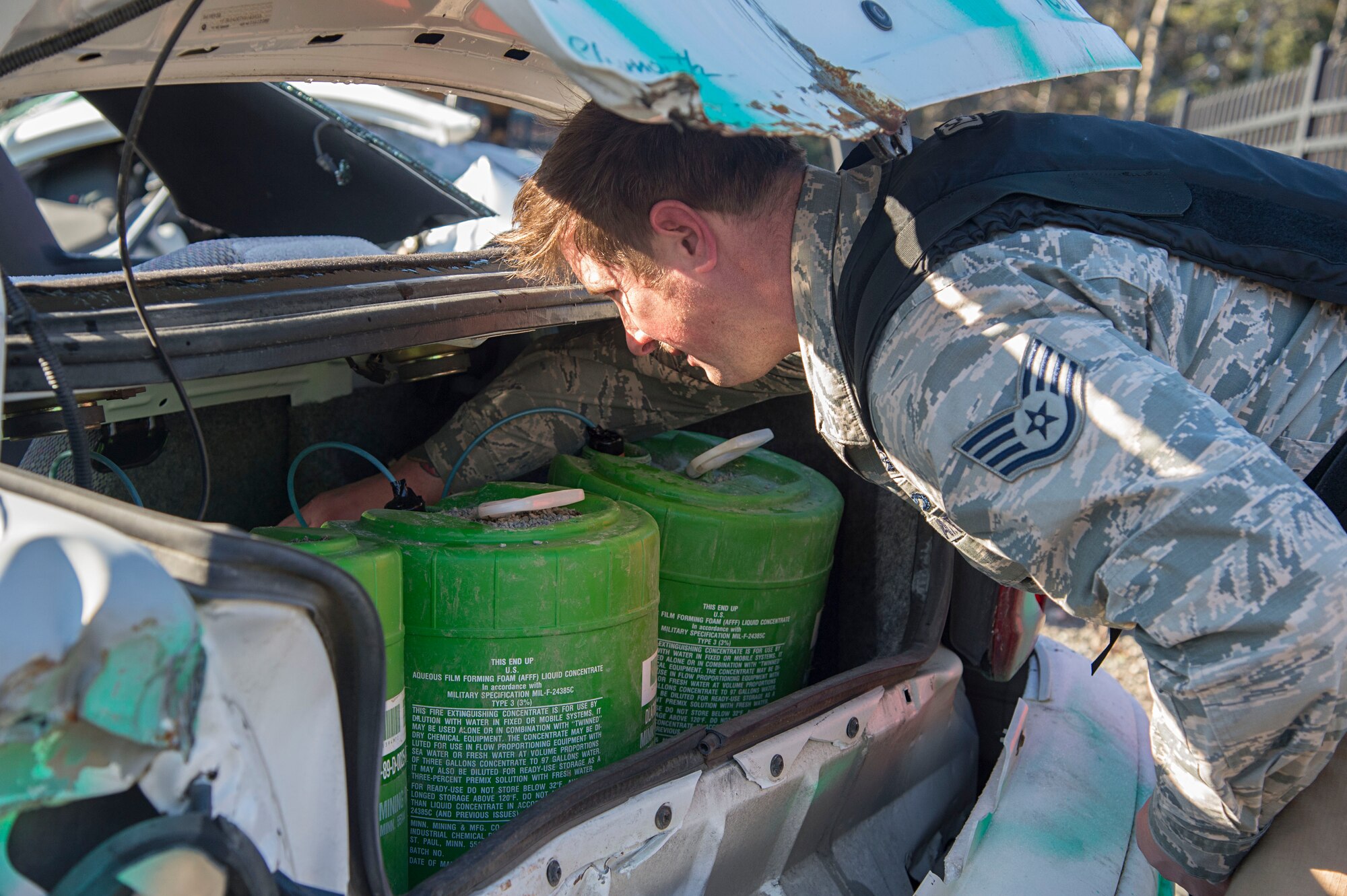 Air Force Staff Sgt. Zacheriah Sekula, 673d Civil Engineer Squadron explosive ordnance disposal team leader, defuses a simulated vehicle-borne improvised explosive device during a Mission Assurance Exercise at Joint Base Elmendorf-Richardson, Alaska, Oct. 17, 2017. The MAE was an anti-terrorism force protection exercise that simulated a threat against the base.