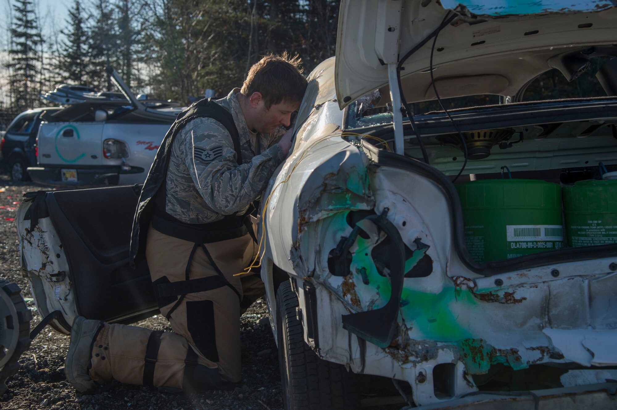 Air Force Staff Sgt. Zacheriah Sekula, 673d Civil Engineer Squadron explosive ordnance disposal team leader, defuses a simulated vehicle-borne improvised explosive device during a Mission Assurance Exercise at Joint Base Elmendorf-Richardson, Alaska, Oct. 17, 2017. The MAE was an anti-terrorism force protection exercise that simulated a threat against the base.