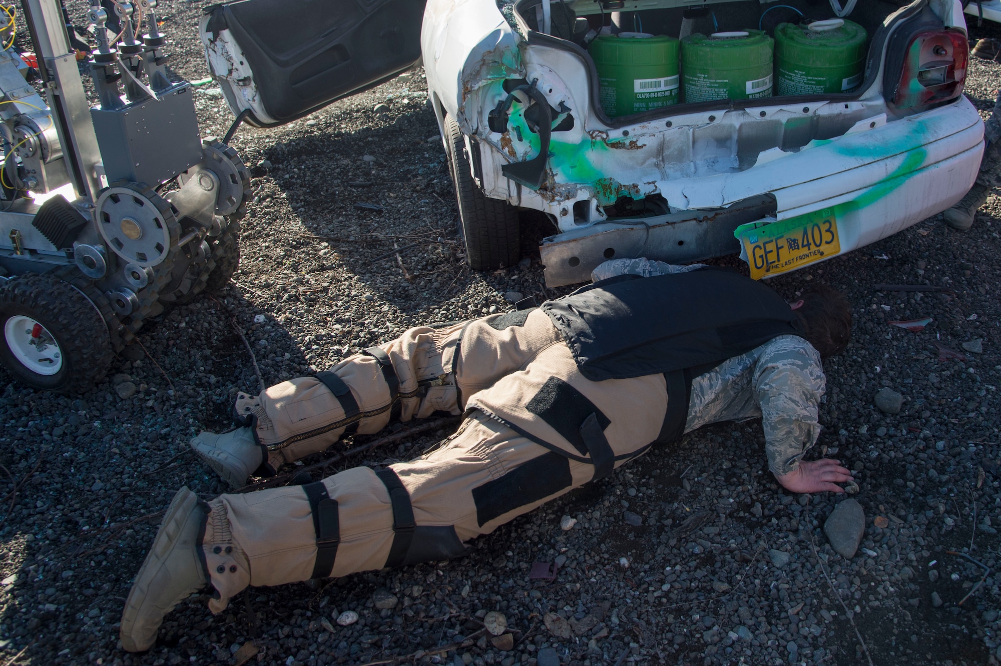 Air Force Staff Sgt. Zacheriah Sekula, 673d Civil Engineer Squadron explosive ordnance disposal team leader, defuses a simulated vehicle-borne improvised explosive device during a Mission Assurance Exercise at Joint Base Elmendorf-Richardson, Alaska, Oct. 17, 2017. The MAE was an anti-terrorism force protection exercise that simulated a threat against the base.
