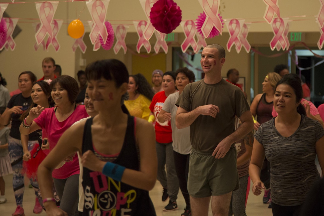 CAMP FOSTER, OKINAWA, Japan – The local and military communities dance during the Breast Cancer Awareness Zumbathon to help spread awareness during Breast Cancer Awareness Month Oct. 20 at the Community Center aboard Camp Foster, Okinawa, Japan.