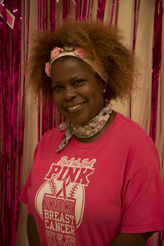 CAMP FOSTER, OKINAWA, Japan – Saundra Ladd poses for a photo during the Breast Cancer Awareness Zumbathon Oct. 20 at the Community Center aboard Camp Foster, Okinawa, Japan.