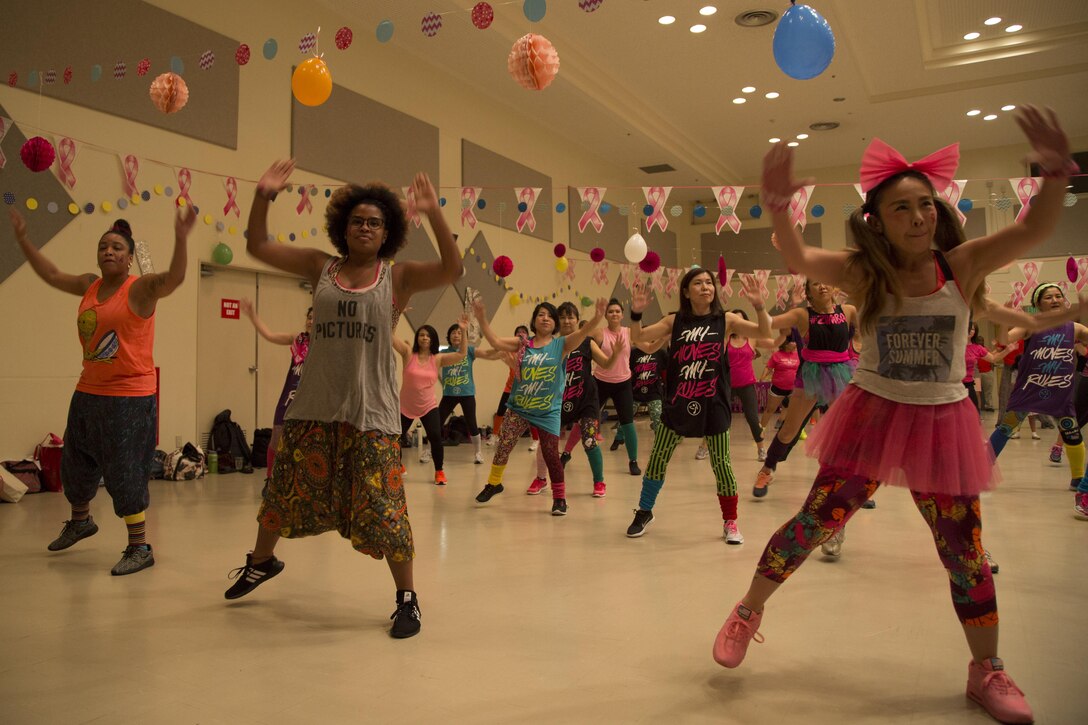 CAMP FOSTER, OKINAWA, Japan – The military and local communities come together for two hours of Zumba to help spread awareness at the Breast Cancer Awareness Zumbathon Oct. 20 at the Community Center aboard Camp Foster, Okinawa, Japan.